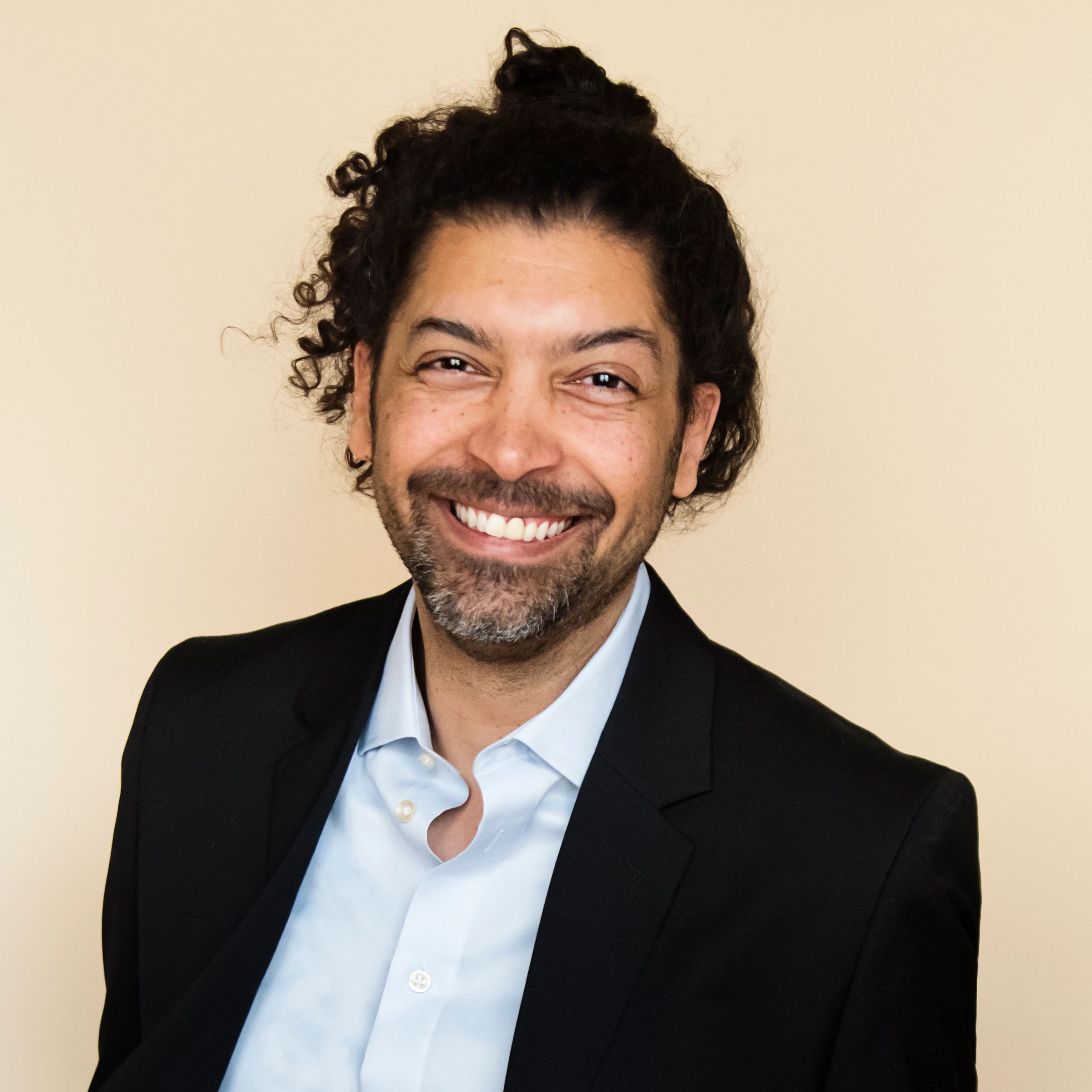 Professional portrait representing brand strategy leadership